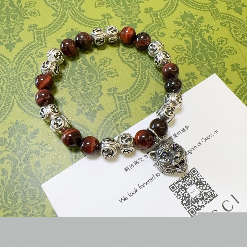 G*u*i bracelets